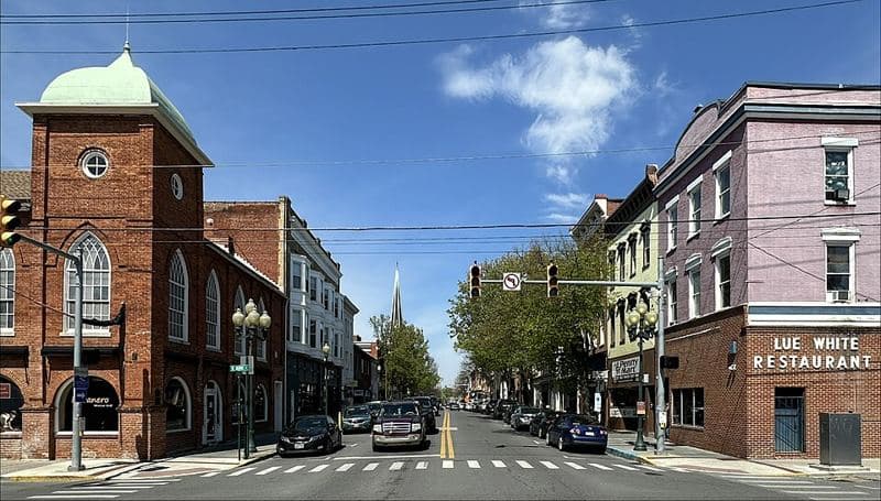 Facing north on Queen Street (at the intersection with Burke Street) in Martinsburg, West Virginia. The buildings are contributing propertie